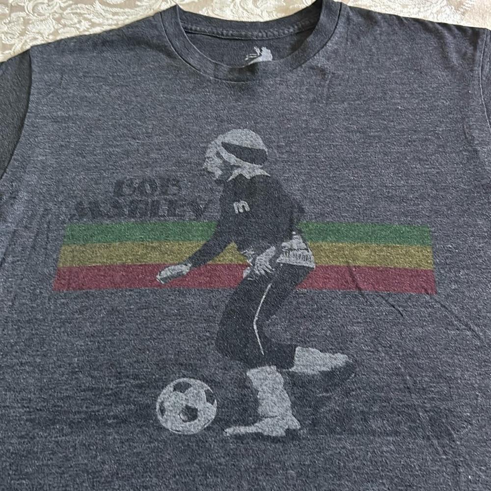 T shirts 1black & 1 grey Bob Marley. Very cool